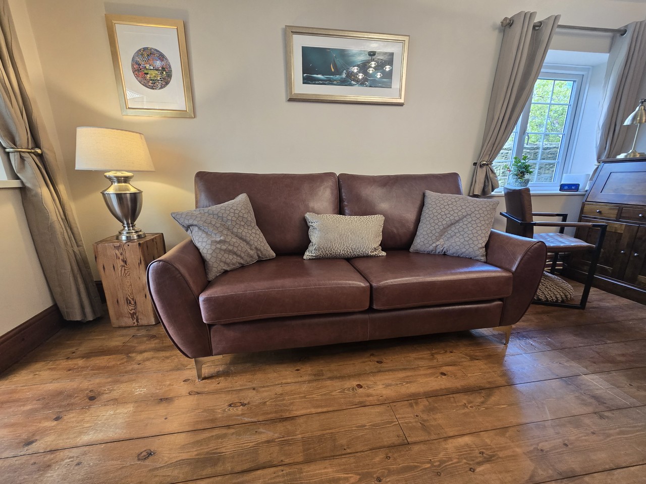 Warm brown Clifton sofa in a furnished room