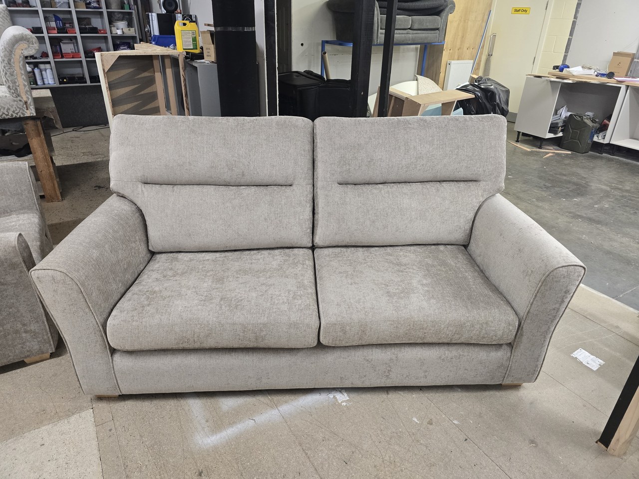 Light grey Alston sofa with tall divided back cushions and gently flared arms.