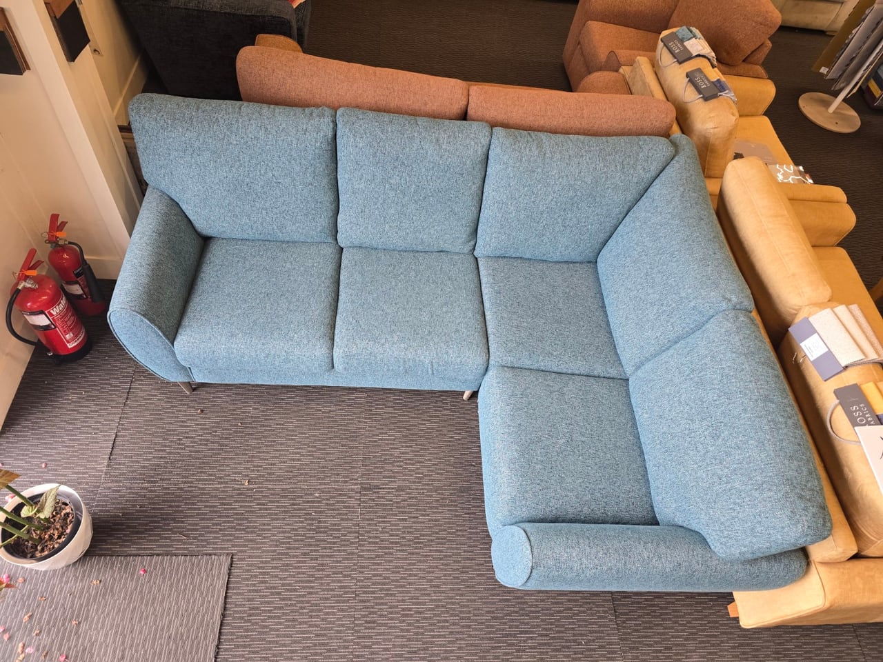 Overhead photograph showing the two runs of the blue teal Clifton corner sofa