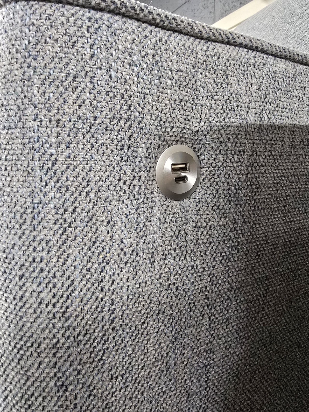 Close-up showing the USB-A and USB-C sockets in the Inca arm fitting